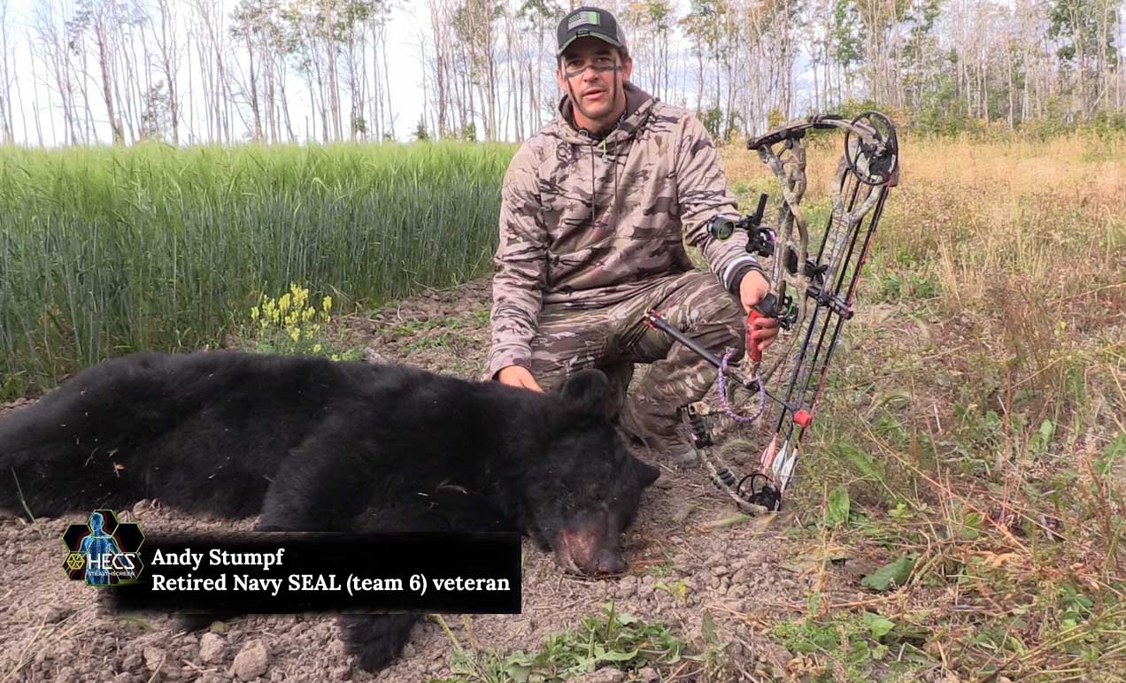 Andy Stumpf in camo hunting a black bear